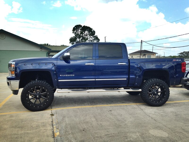 Blue Pickup Truck — Neutral, Afternoon, Photograph, Building