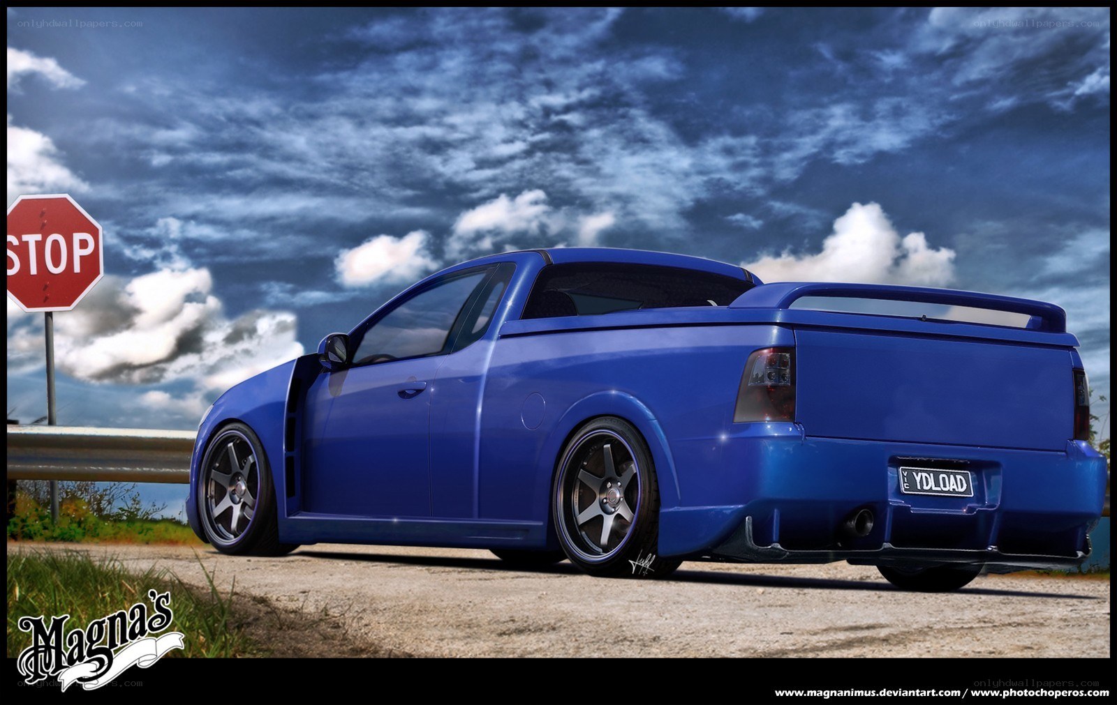 Blue pickup truck on roadside