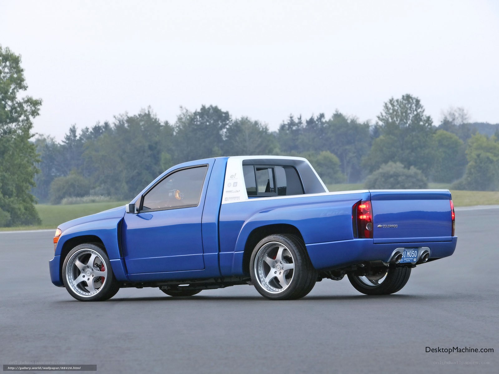 blue pickup truck on track
