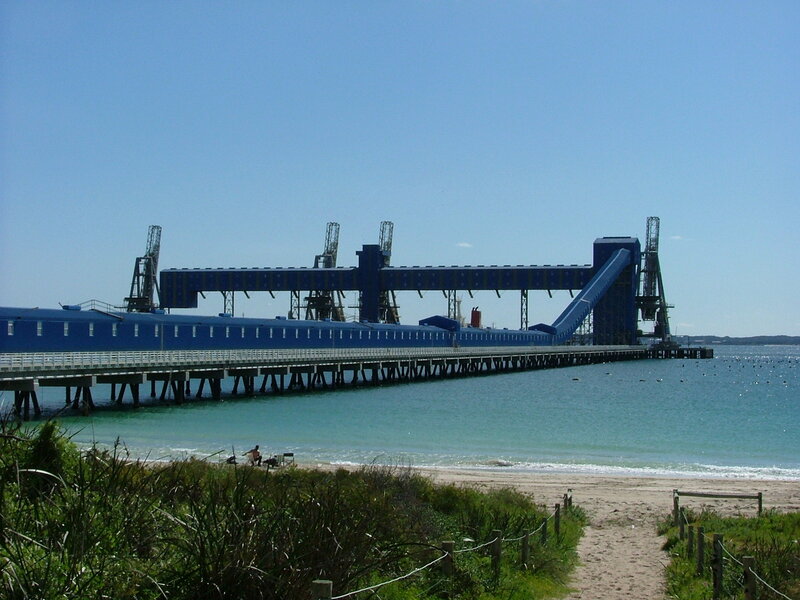 Blue pier at a coastal port