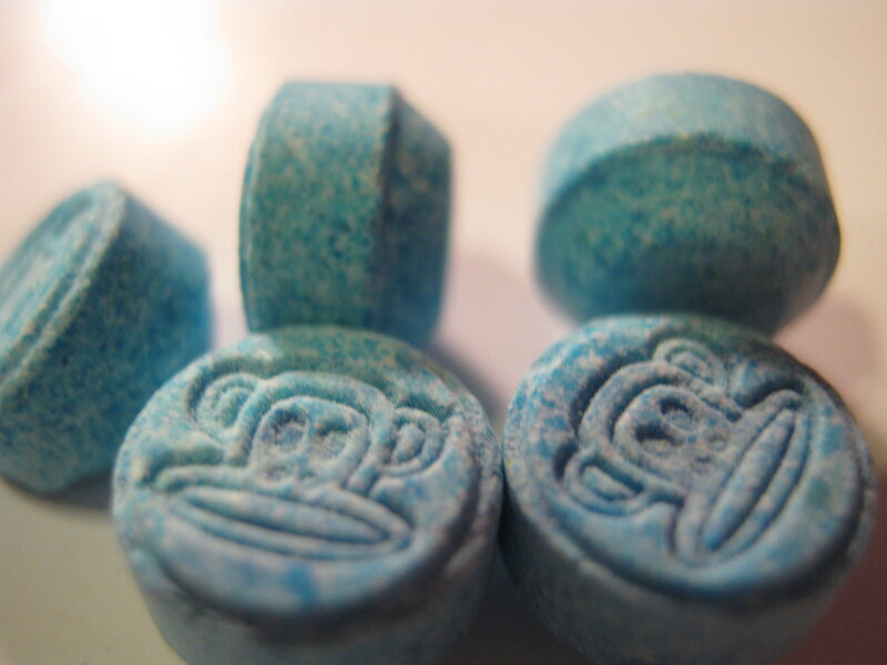 blue pills with monkey logo