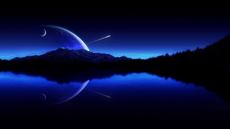 Blue planet over lake