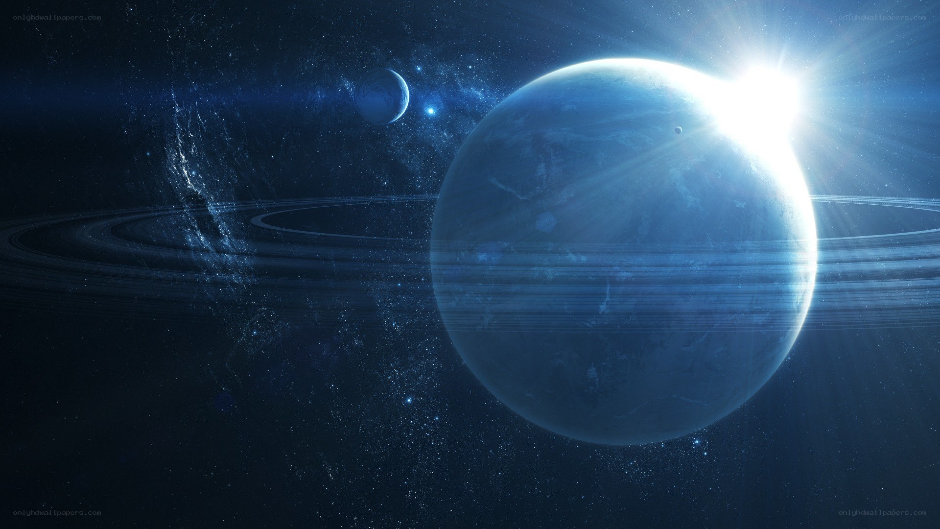 Blue planet with rings in space