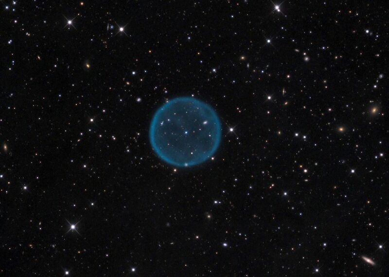 Blue planetary nebula in space
