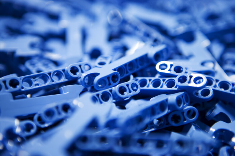 blue plastic pieces in pile