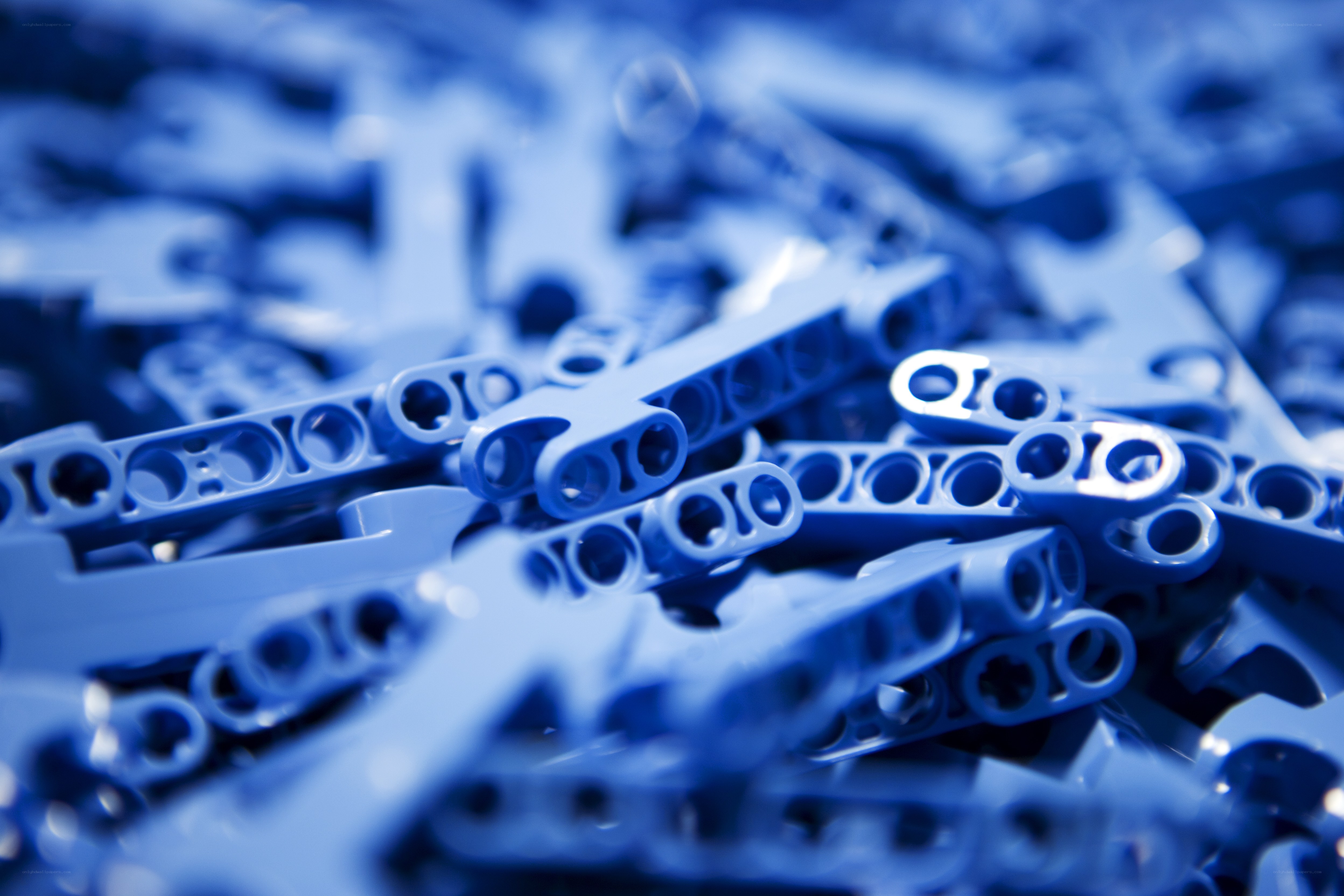 blue plastic pieces in pile