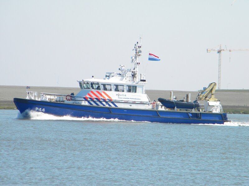 Blue Police Boat — Calm, Afternoon