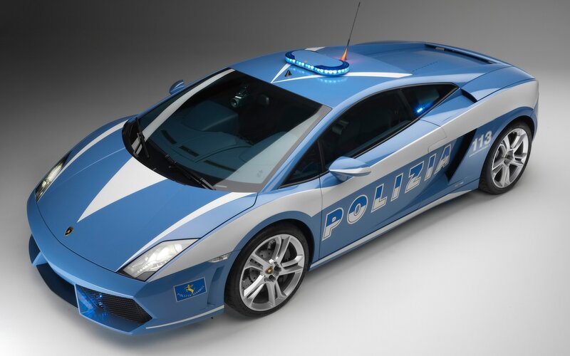 Blue Police Sports Car — Dramatic, Photograph, Light Bar