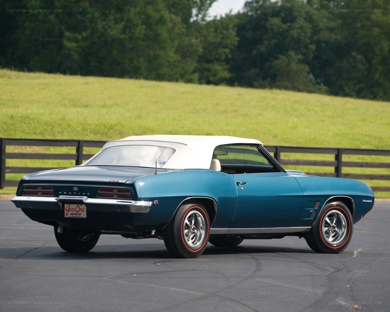 Blue Pontiac Firebird convertible