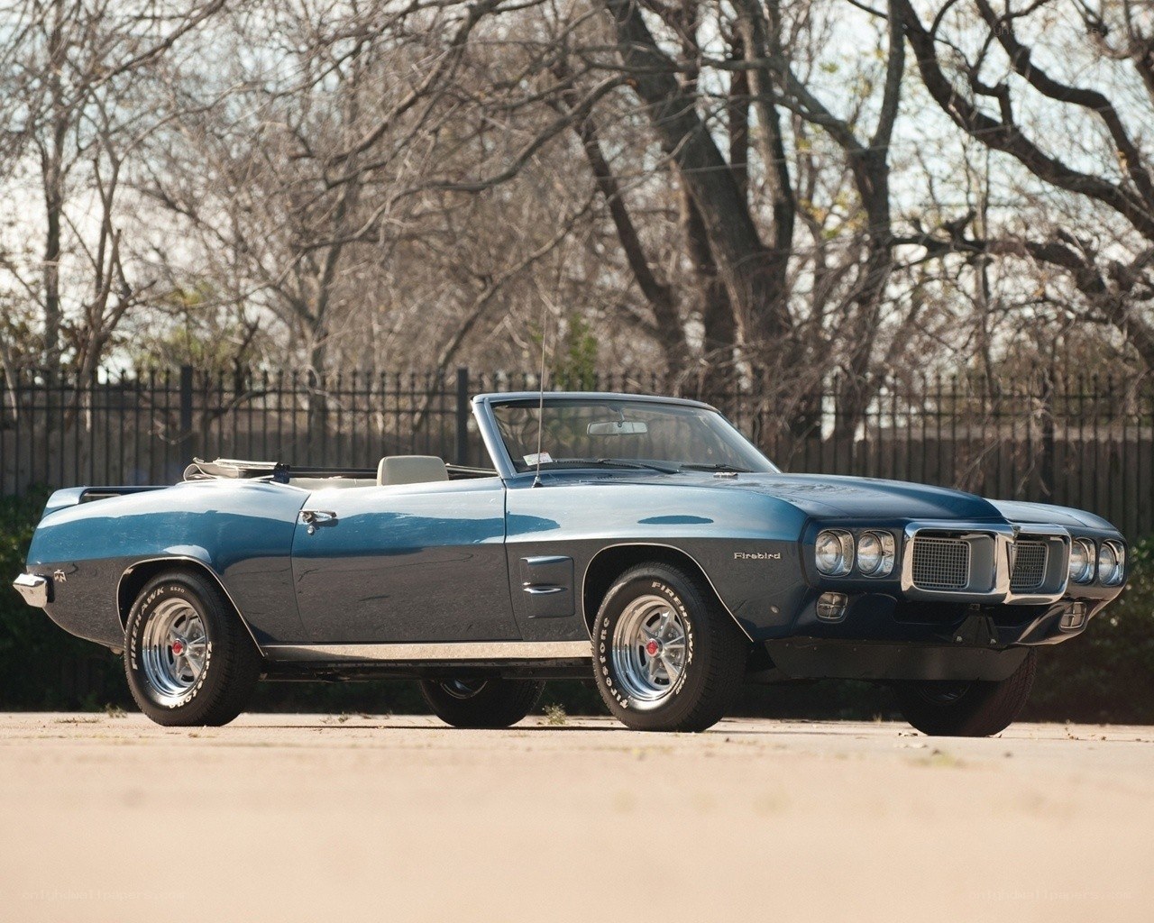 Blue Pontiac Firebird convertible