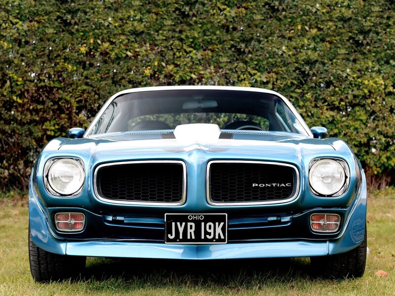 Blue Pontiac Firebird front view