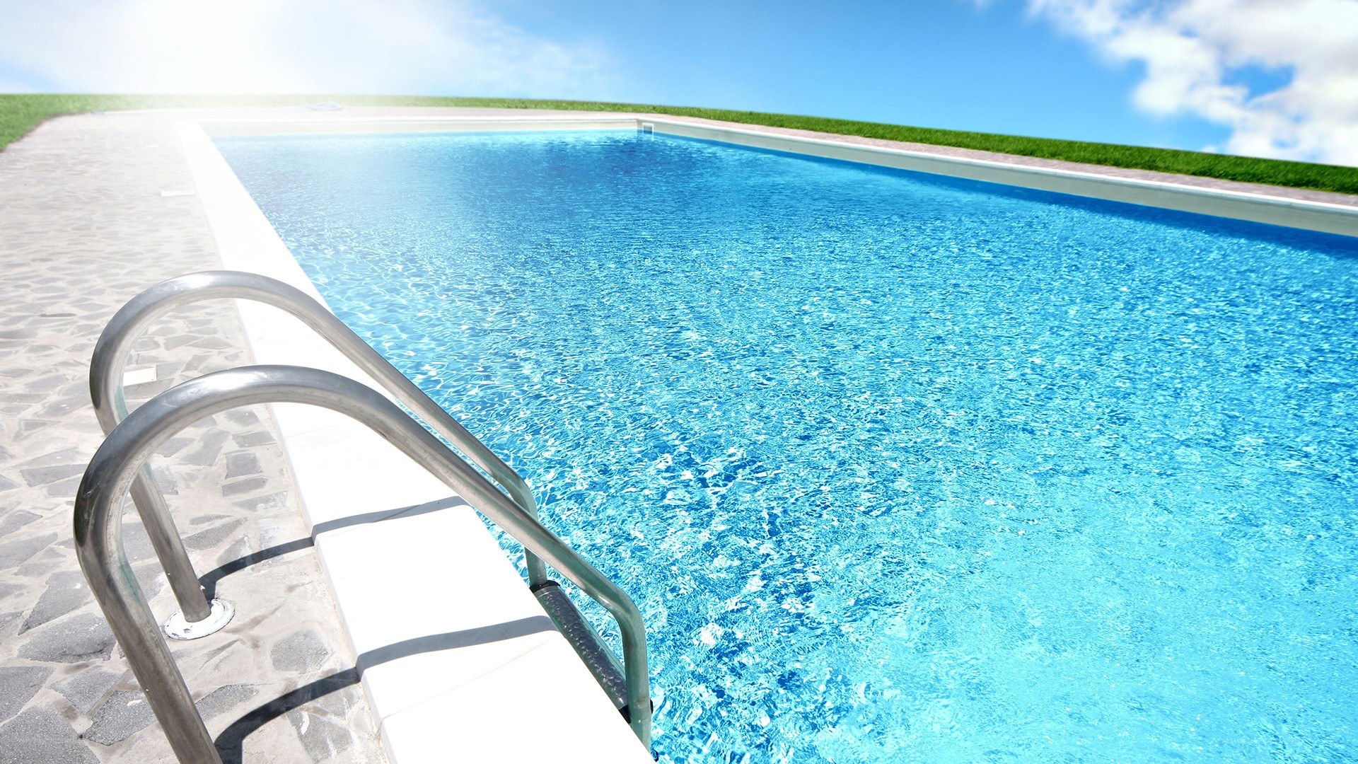 Blue pool on sunny day