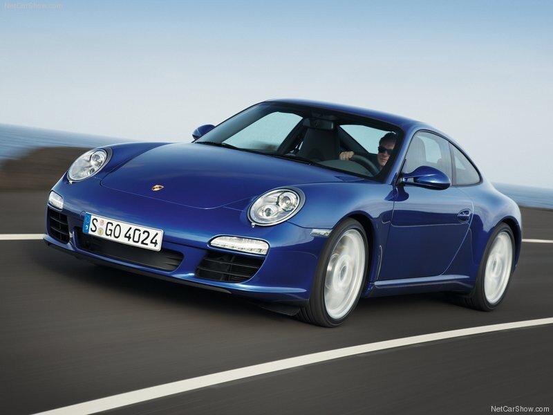 blue porsche 911 in motion