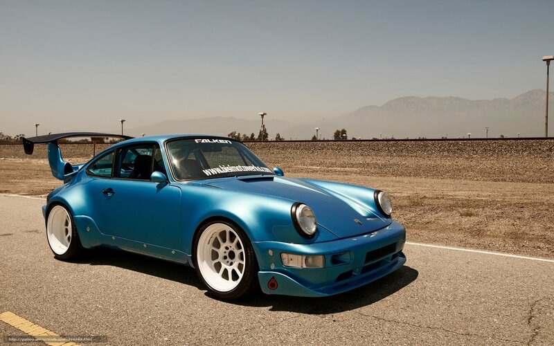 Blue Porsche 911 on a track