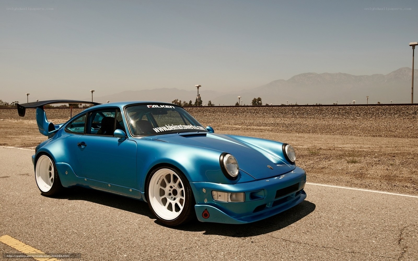 Blue Porsche 911 on a track