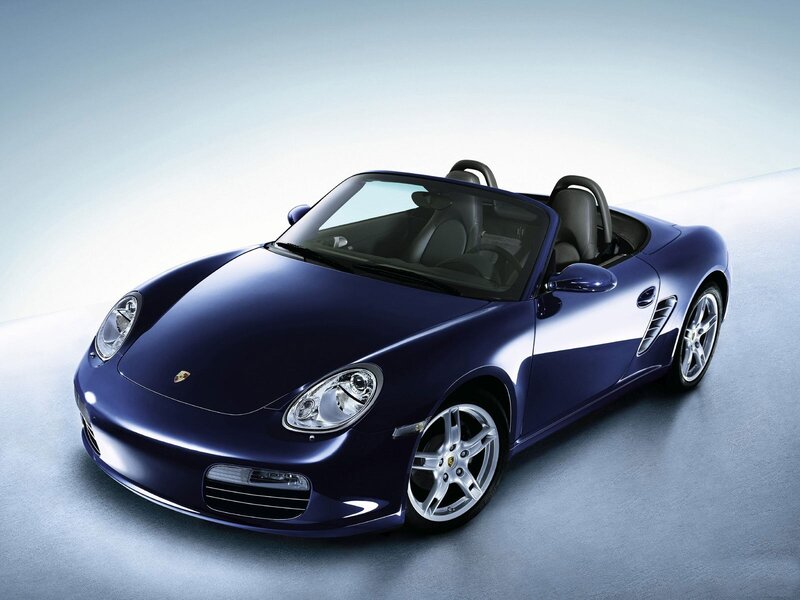 blue porsche boxster sports car