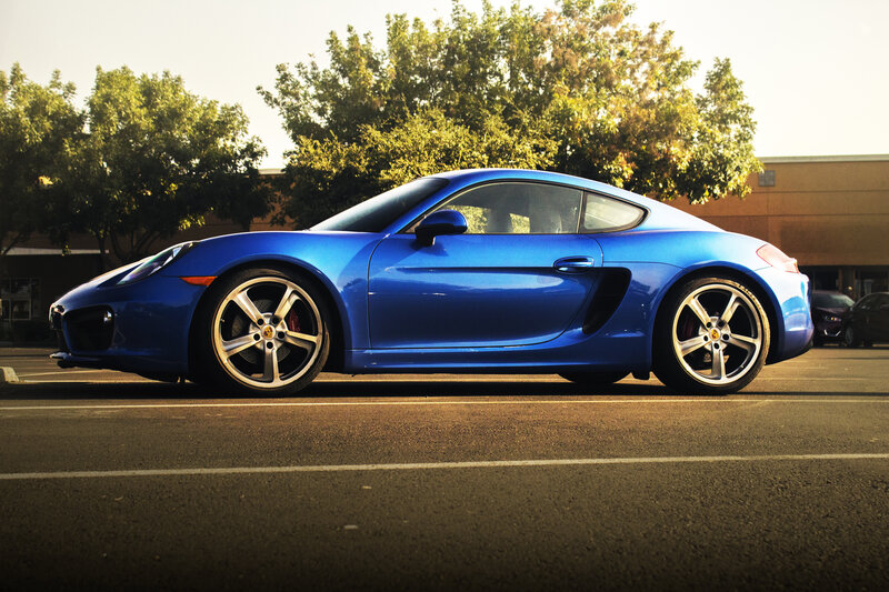 Blue Porsche Car — Dramatic