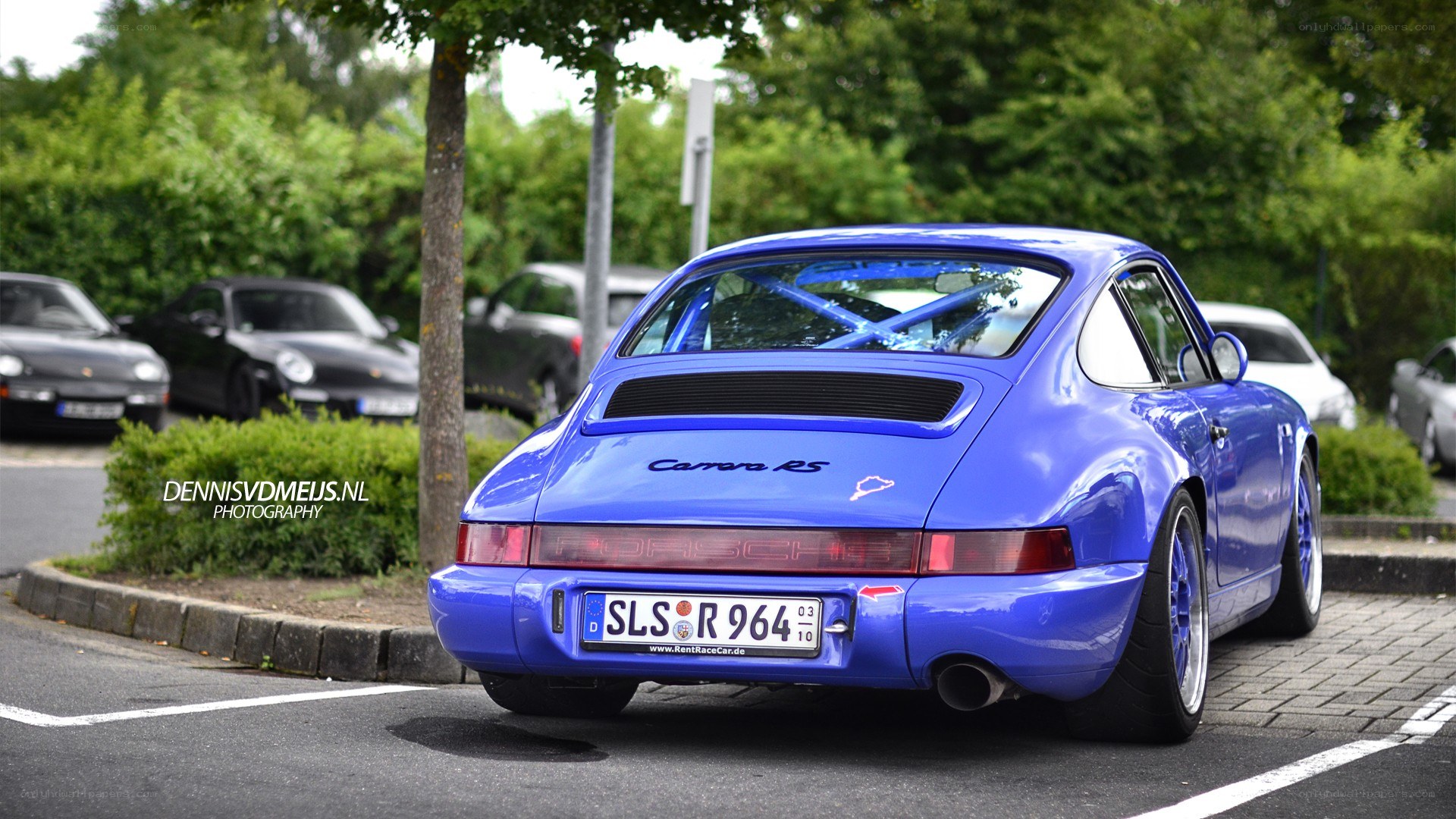 blue porsche carrera rs