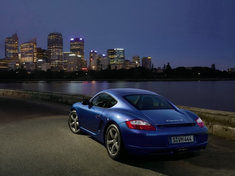 Blue Porsche Cayman S at night