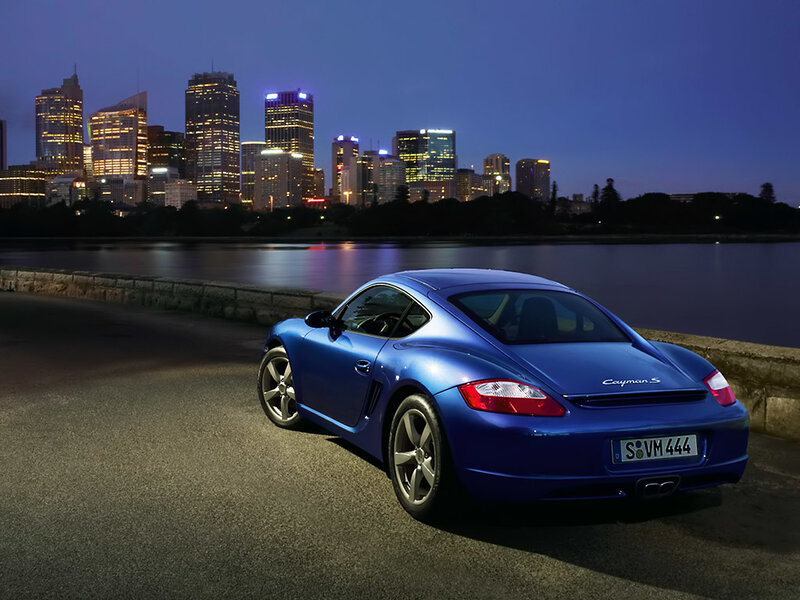 Blue Porsche Cayman S — Dramatic