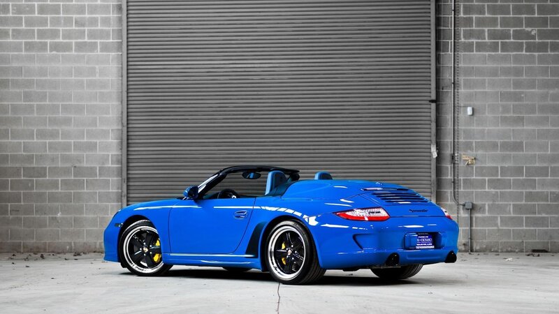 blue porsche convertible car