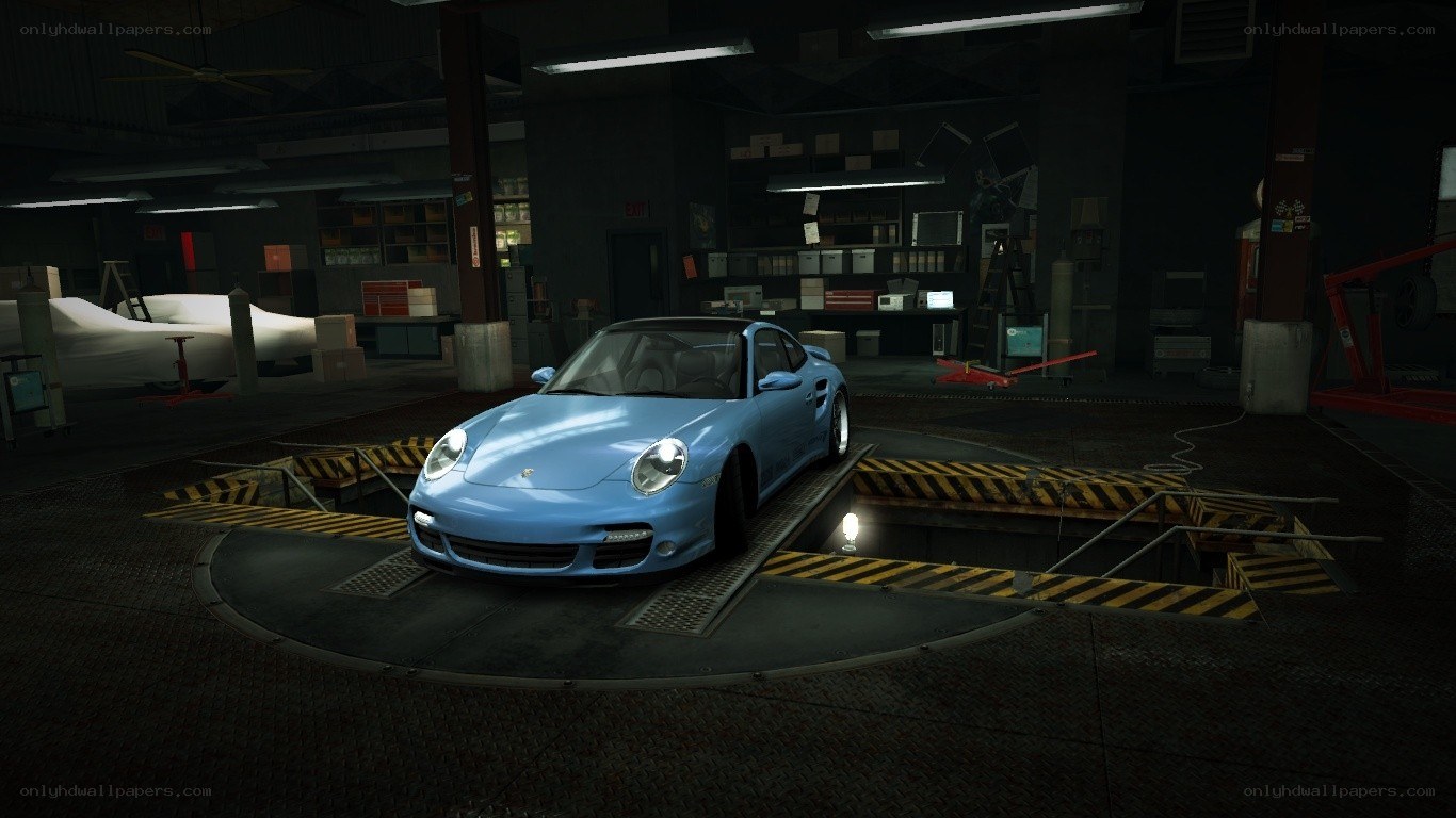 Blue Porsche in garage