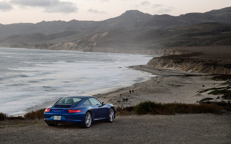 Blue Porsche on Cliff