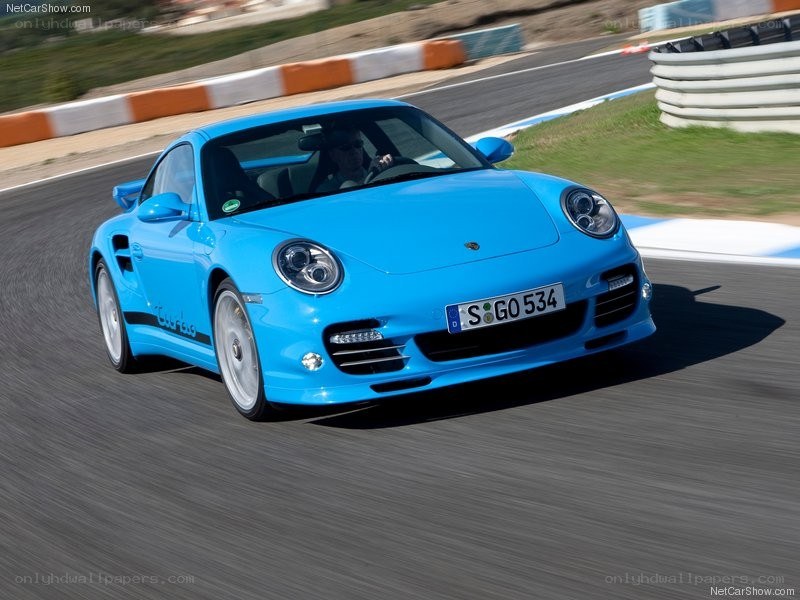 blue porsche on racetrack