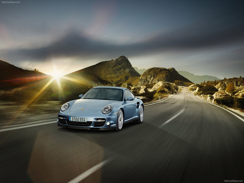 Blue Porsche on Road