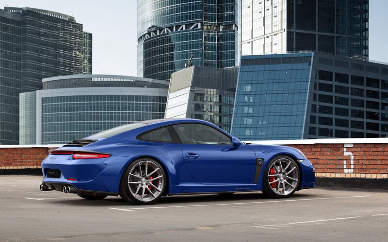 Blue Porsche on rooftop
