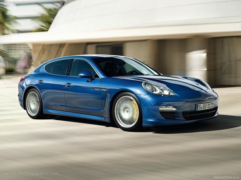 blue porsche panamera in motion