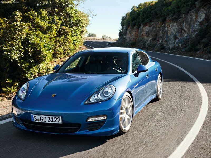 Blue Porsche Panamera on winding road