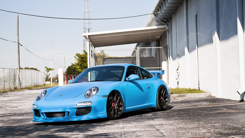 blue porsche sports car