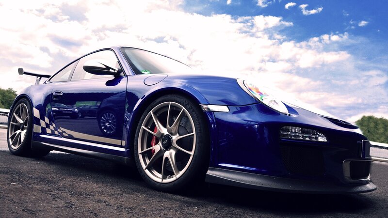 blue porsche sports car