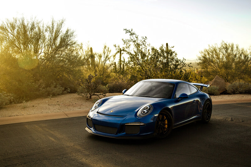 Blue Porsche Sports Car — Dramatic, Sunset