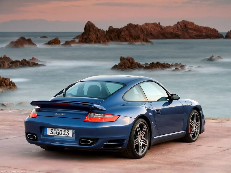 Blue Porsche Turbo by the sea