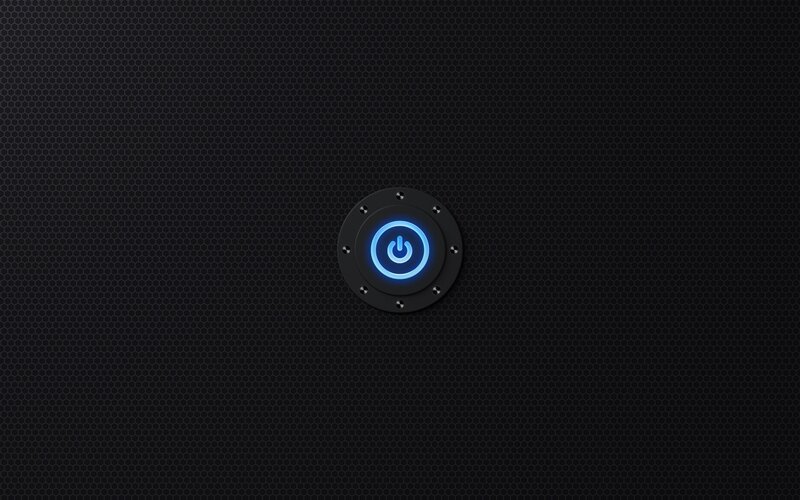 blue power button on black mesh