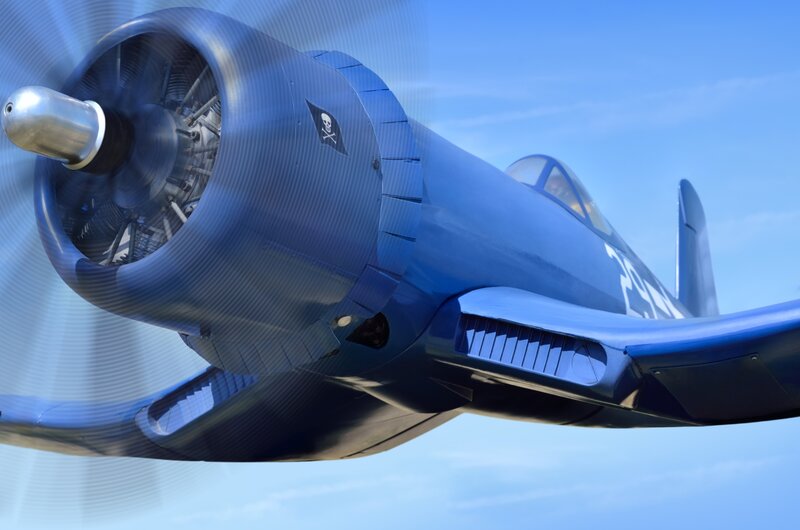 Blue Propeller Plane — Dynamic, Afternoon