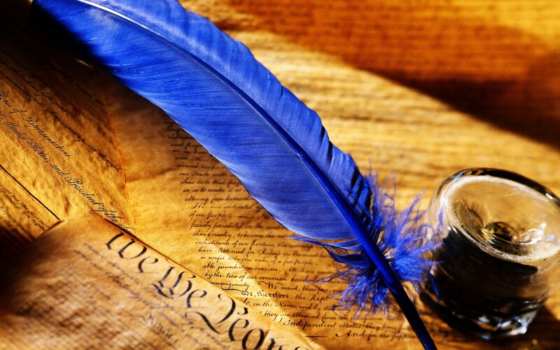Blue Quill Pen on Document — Dramatic