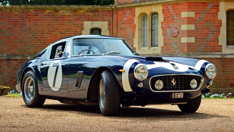 Blue Race Car — Calm, Afternoon, Photograph, Brick Building