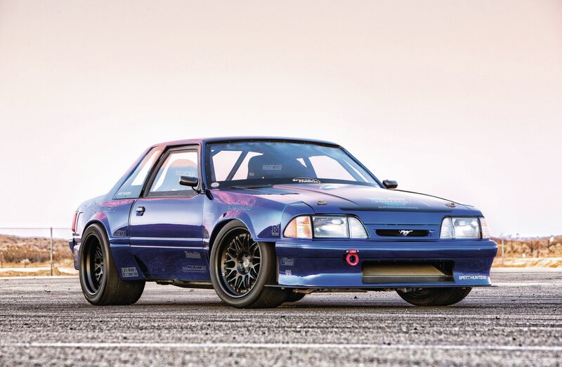 Blue Race Car — Dramatic, Afternoon, Photograph, Race Track