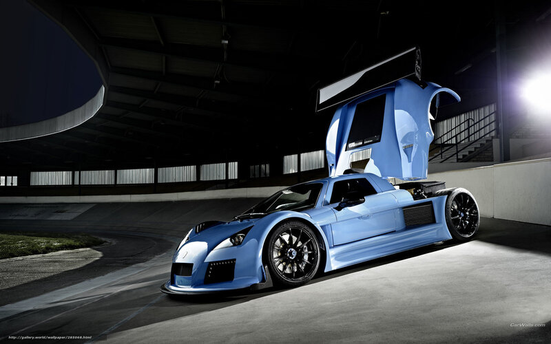 Blue Race Car — Dramatic, Night, Photograph, Race Track, Open Door