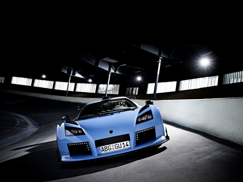 Blue Race Car — Dramatic, Night, Photograph, Race Track
