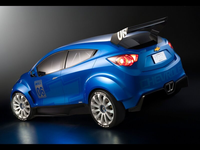 Blue Race Car — Dramatic, Photograph, Rear Wing, Tires