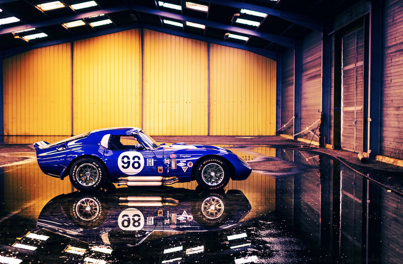 Blue Race Car — Dramatic, Photograph, Reflection