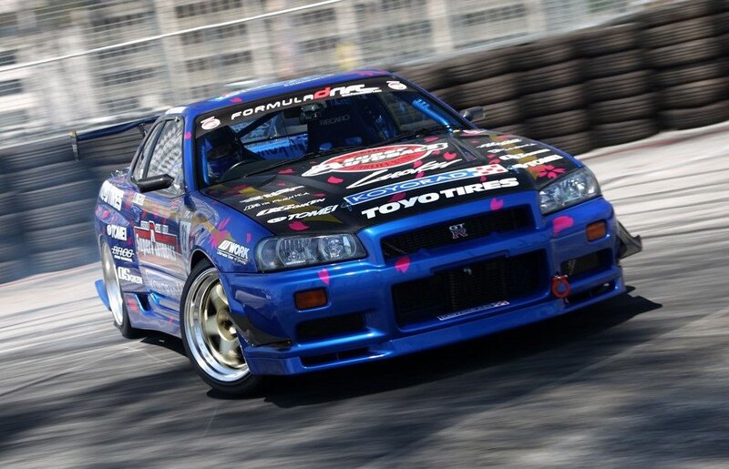 Blue Race Car Drifting — Dynamic, Afternoon, Photograph, Race Track
