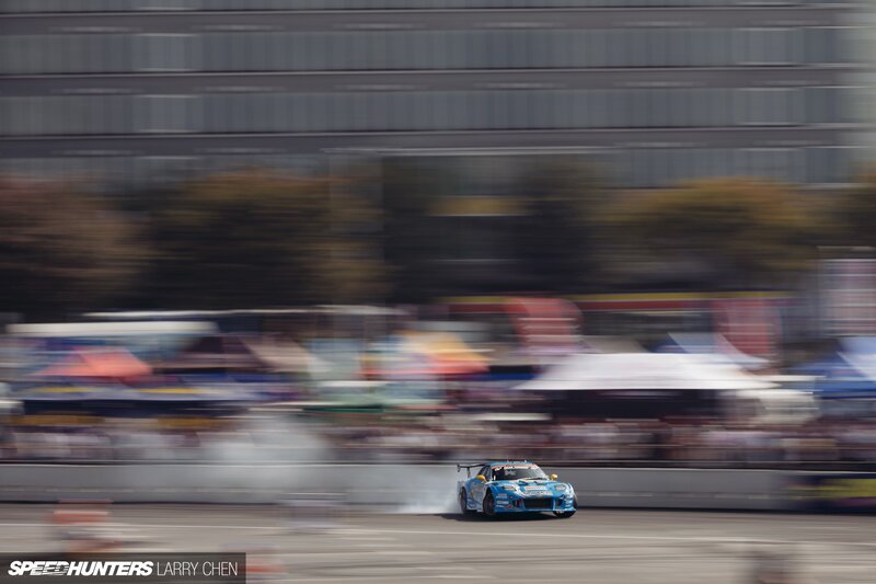 Blue Race Car Drifting — Dynamic, Afternoon, Photograph