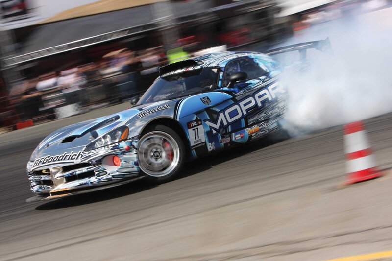 Blue Race Car Drifting — Dynamic, Afternoon
