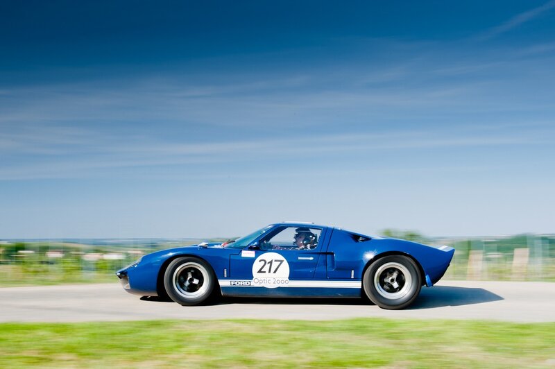 Blue Race Car — Dynamic, Afternoon, Photograph, Driver, Road