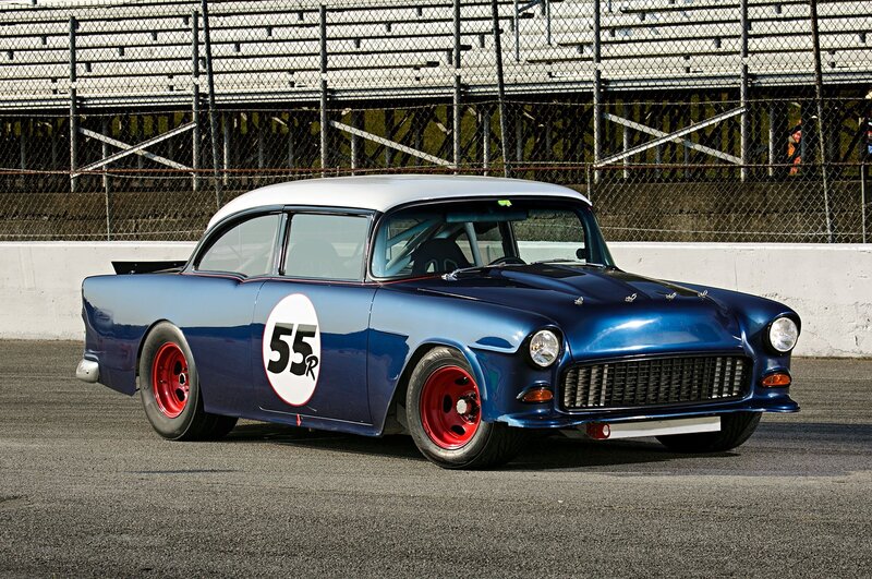 Blue Race Car — Dynamic, Afternoon, Photograph, Race Track, Fence
